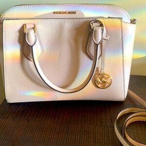 Classy mid-size baby pink Micheal Kors handbag